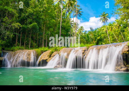 Cambugahay Falls surrounded bu jungle foliage, Lazi, Siquijor Island, Central Visayas, Philippines Stock Photo