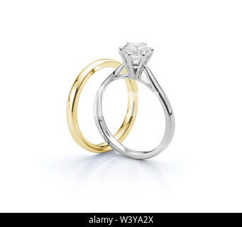 White Gold Diamond Engagement Ring with Yellow Gold Wedding Ring on White Background Stock Photo