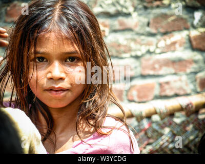 Amroha, Utter Pradesh, INDIA - 2011: Unidentified poor people living in slum - smiling children Stock Photo