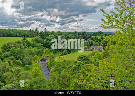 DAVA WAY SCOTLAND THE DIVIE  OR EDINKILLIE RAILWAY VIADUCT  MID SUMMER VIEW OF THE RIVER AND MANSE FROM THE TOP OF THE VIADUCT Stock Photo