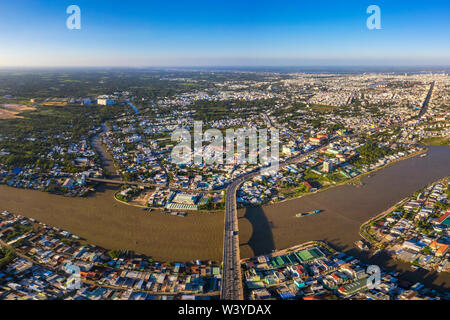 CAN THO, VIETNAM - FEB 08, 2019:Top view aerial view of Cai Rang bridge, Can Tho City, Vietnam with development buildings, transportation. Stock Photo