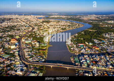 CAN THO, VIETNAM - FEB 08, 2019:Top view aerial view of Cai Rang bridge, Can Tho City, Vietnam with development buildings, transportation. Stock Photo