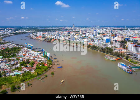 Top aerial view Love bridge or Ninh Kieu wark bridge Can Tho City, Vietnam with development buildings, transportation, energy power infrastructure