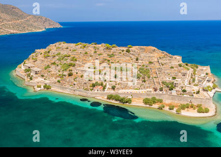 Aerial drone view of the former ancient fortress and leper colony island of Spingalonga on the Greek island of Crete Stock Photo