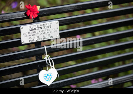 18 Jul 2019, Stockport, United Kingdom. The memorial bench to Martyn Hett, one of the 22 people who died during an explosion at the Manchester Arena o Stock Photo