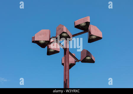 Modern street light against blue sky Stock Photo
