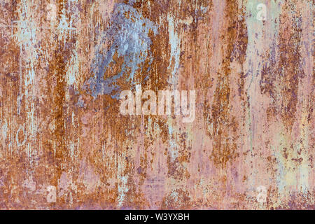 rust, rusty metal wall, old metal sheet covered with paint, rust and scratches Stock Photo