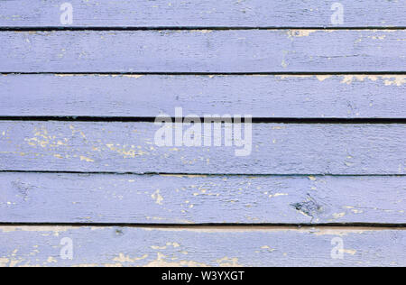 wooden background, blue wooden wall,with holes and weathered paint Stock Photo