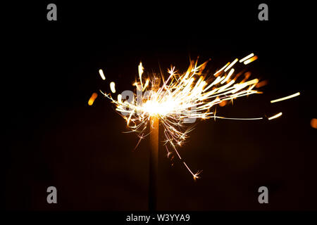 Burning Bengal New Year's fire on a black background Stock Photo