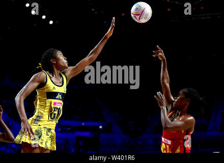 Jamaica's Kadie-ann Dehaney and Uganda's Ruth Meeme in action during the Netball World Cup match at the M&S Bank Arena, Liverpool. Stock Photo