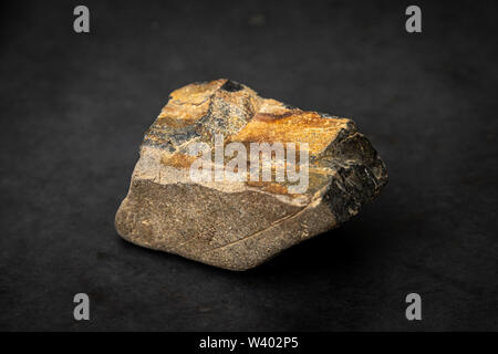 Muskovit gemstone containing high concentration of iron ore Stock Photo