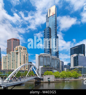 Eureka Tower and other high rise buildings on Southbank with Evan Walker Bridge crossing the Yarra River in foreground, Melbourne, Victoria, Australia Stock Photo