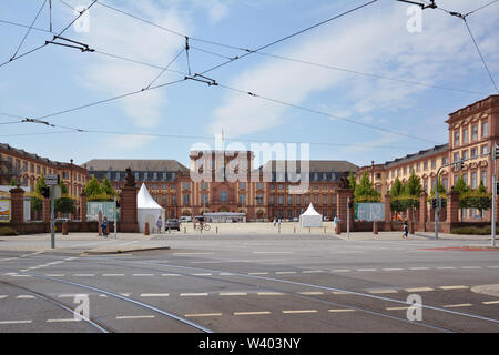 Mannheim, Germany - July 2019: Front view with gates of Mannheim Baroque Palace on summer day Stock Photo