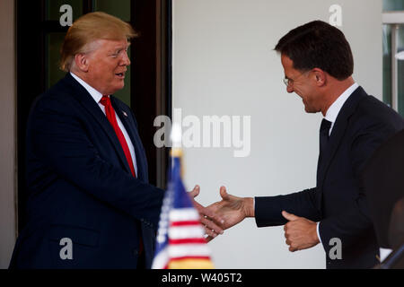 Washington, USA. 18th July, 2019. U.S. President Donald Trump (L) welcomes Dutch Prime Minister Mark Rutte at the White House in Washington, DC, the United States, on July 18, 2019. Credit: Ting Shen/Xinhua/Alamy Live News Stock Photo