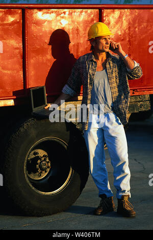 Construction worker wearing a yellow heart Stock Photo