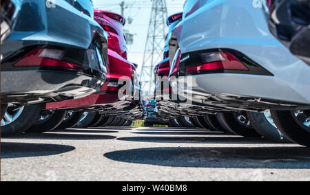 Bumper to bumper, vehicles at the dealer yard. Stock Photo