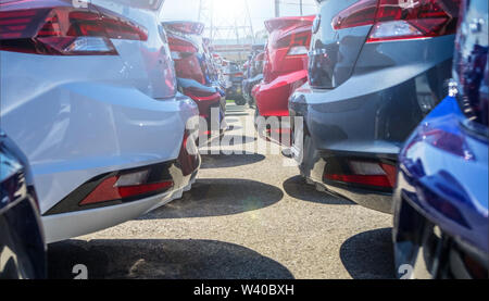 Bumper to bumper, vehicles at the dealer yard. Stock Photo