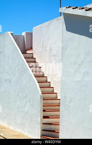 Abstract shapes formed by modern Spanish houses in strong sunlight , Cala Blanca Minorca  Balearic Islands Spain Europe Stock Photo