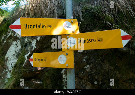 Some hiking pathway sign captured in the village of Bignasco in the beautiful Maggia Valley in Ticino, Switzerland Stock Photo