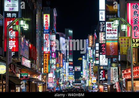 Tokyo, Japan - APRIL 3, 2017 : Nightlife in Shinjuku. Shinjuku is one of Tokyo's business districts with many international corporate headquarters loc Stock Photo