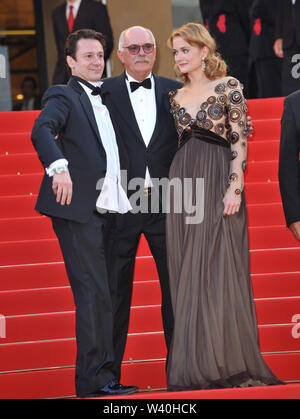 CANNES, FRANCE. May 23, 2010: Director Nikita Mikhalkov (glasses), actress Nadezhda Mihalkova & actor Artem Menshikov at the premiere of their movie 'Exodus - Burnt by the Sun' at the 63rd Festival de Cannes. © 2010 Paul Smith / Featureflash Stock Photo