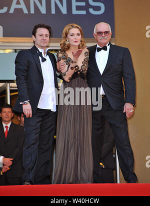 CANNES, FRANCE. May 23, 2010: Director Nikita Mikhalkov (glasses), actress Nadezhda Mihalkova & actor Artem Menshikov at the premiere of their movie 'Exodus - Burnt by the Sun' at the 63rd Festival de Cannes. © 2010 Paul Smith / Featureflash Stock Photo