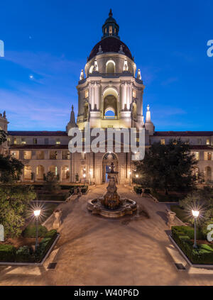 Image of the Pasadena City Hall courtyard and main tower including the crescent moon in the western sky. Stock Photo
