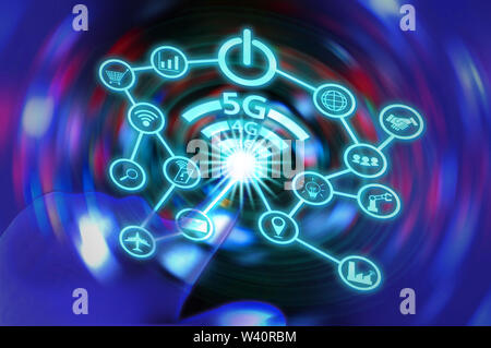 Blurred LED screen closeup. Glowing threads in a color spectrum on a black background. Stock Photo