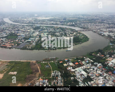 Saigon, Vietnam - Jul 6, 2019. Aerial view of Saigon (called Ho Chi Minh City), Vietnam. Saigon population is expected to grow to 13.9 million by 2025 Stock Photo