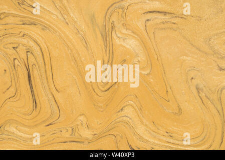gold color painted marble texture background Stock Photo