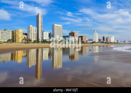 Reflection of Durban 'Golden Mile' beachfront in the Indian Ocean, KwaZulu-Natal province of South Africa Stock Photo