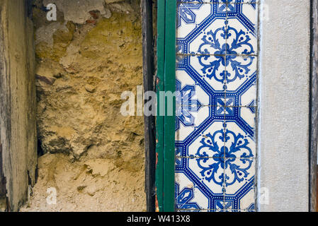 Close up traditional portuguese ceramic tiles ( Azulejos) on the facade of a house in Lisbon, Portugal Stock Photo