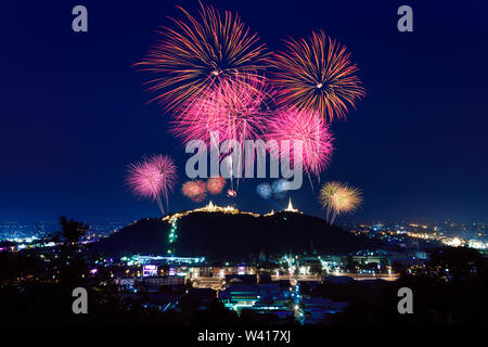 Firework over the mountain in the festival Phra Nakhon Khiri Khao Wang, Phetchaburi, Thailand. Stock Photo