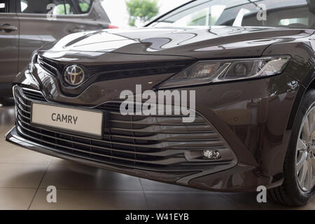 Russia, Izhevsk - July 18, 2019: New cars in the Toyota showroom. Modern Camry. Famous world brand. Prestigious vehicles. Stock Photo