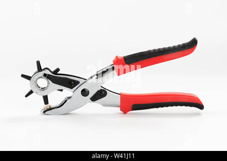 Multiple revolving diameters puncher on white backgroung Stock Photo