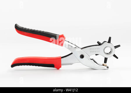 Multiple revolving diameters puncher on white backgroung Stock Photo