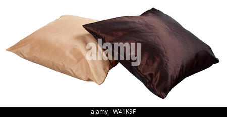 Two brown decorative pillows isolated on white backgroud with clipping path Stock Photo