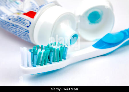Tooth brush with tooth paste on white background Stock Photo
