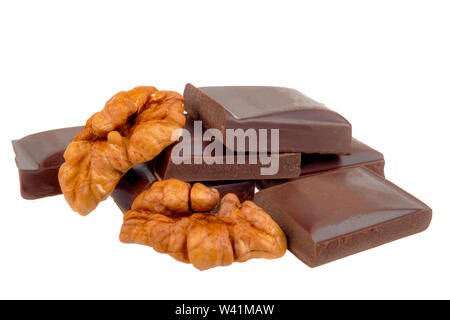 Chocolate bars lie with walnuts on a white background Stock Photo