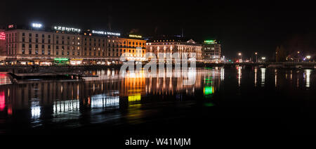 Geneva, Switzerland - November 24, 2016: Night panoramic cityscape with illuminated facades of Geneva city central district Stock Photo