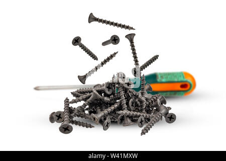 Falling screws black color on a white background close-up Stock Photo