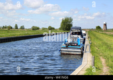 boats moored at west somerton on the edge of martham broad in norfolk Stock Photo