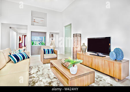 Room With Comfortable Look And Fish Tank Walls Are Painted In