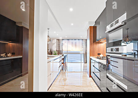 An impressive passage through the kitchen area Stock Photo