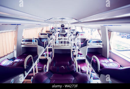 interior of sleeper bus for tourists and other passengers Stock Photo