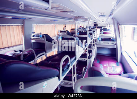 interior of sleeper bus for tourists and other passengers Stock Photo