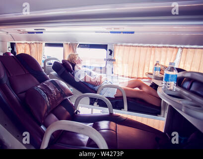 interior of sleeper bus for tourists and other passengers Stock Photo