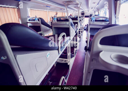 interior of sleeper bus for tourists and other passengers Stock Photo