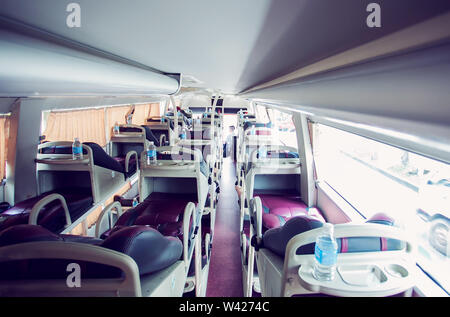 interior of sleeper bus for tourists and other passengers Stock Photo