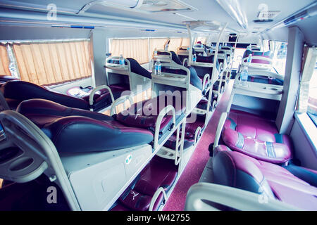 interior of sleeper bus for tourists and other passengers Stock Photo